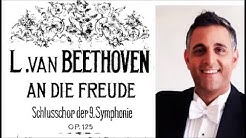 תקריב של יוסף ארידן בחליפה